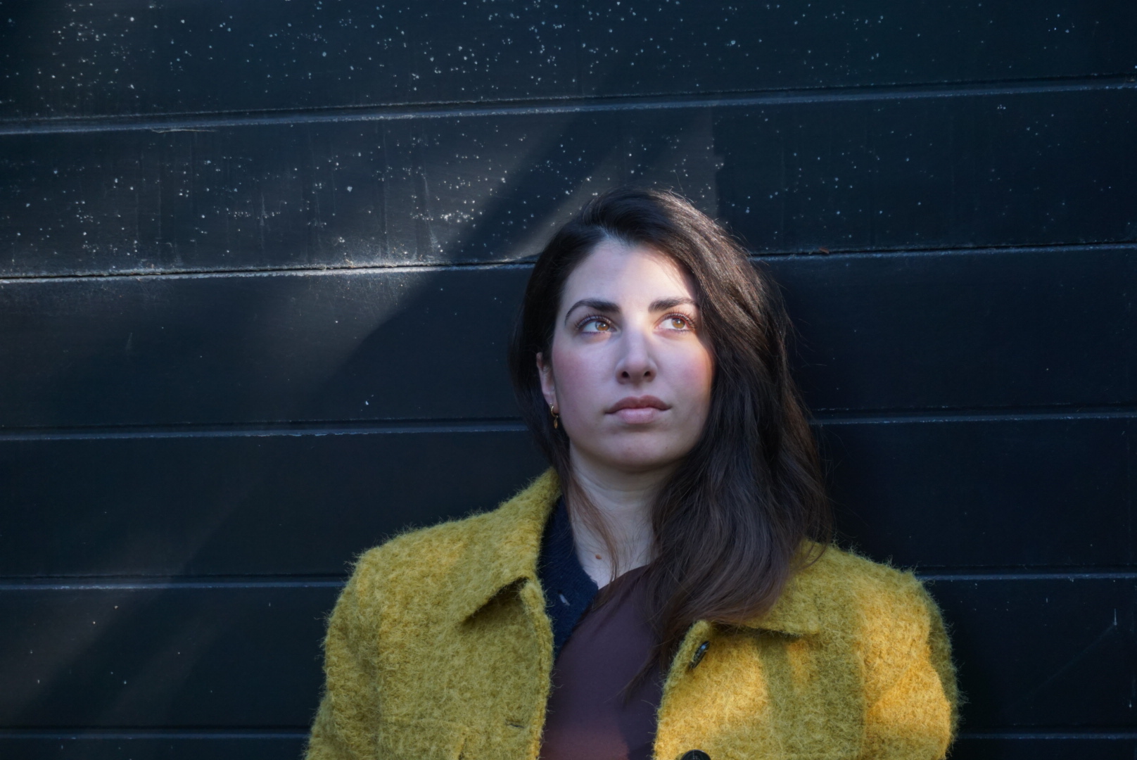 Marianna Spanidi wearing a yellow jacket